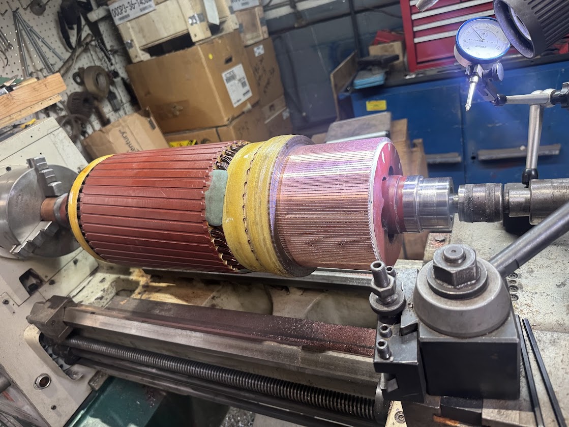 Armature on lathe with commutator turning at A2Z Pump Repair